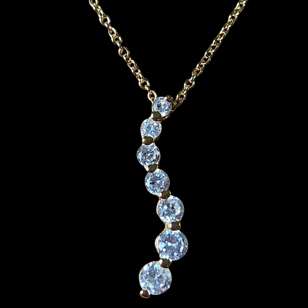 Gold Tone Curved Journey Pendant Necklace with Faux Diamonds Womens